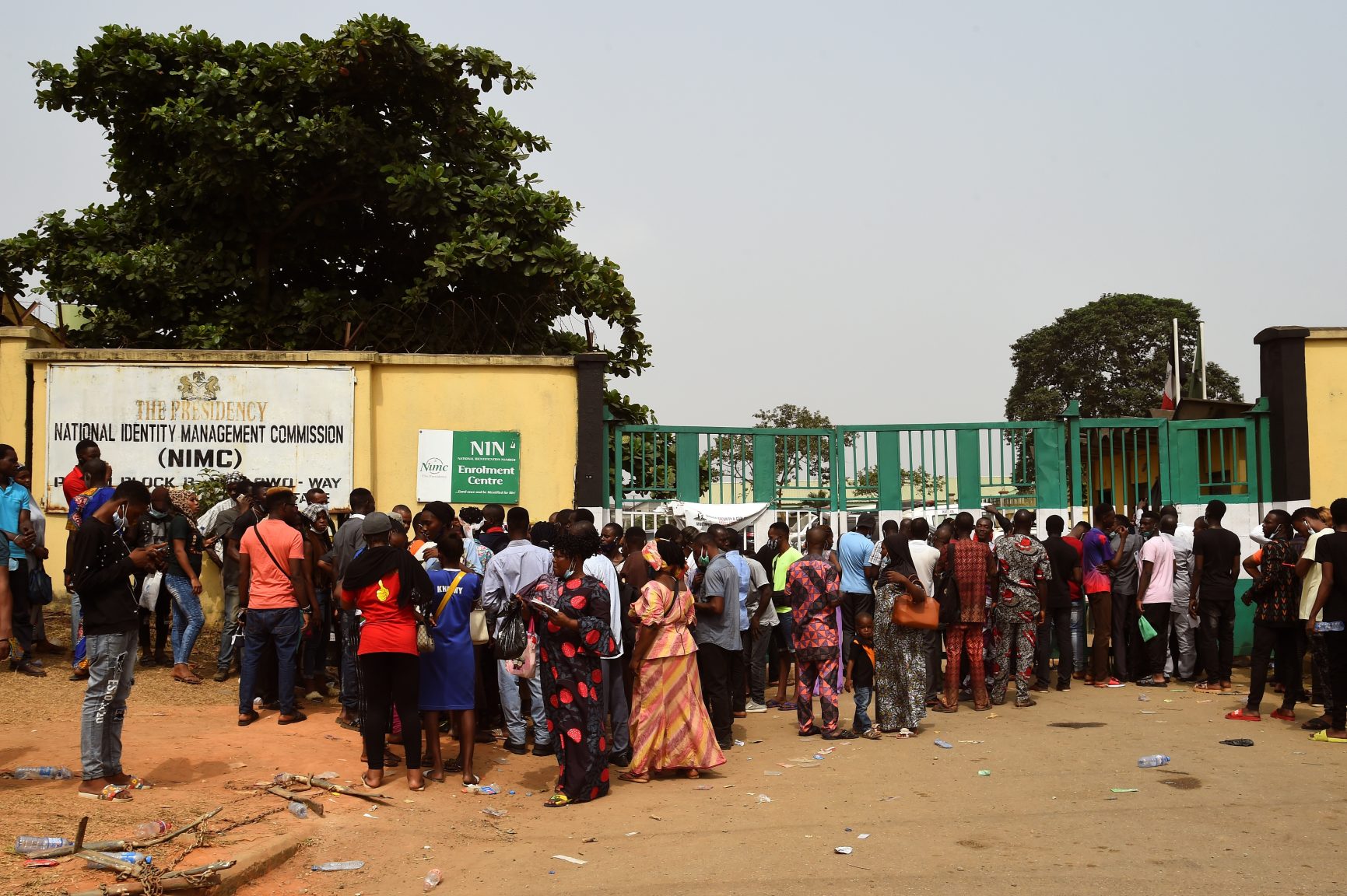Applicants queue to obtain national identity numbers at the National Identity Management Commission (NIMC) office, in the Lagos state capital of Ikeja, on December 30, 2020