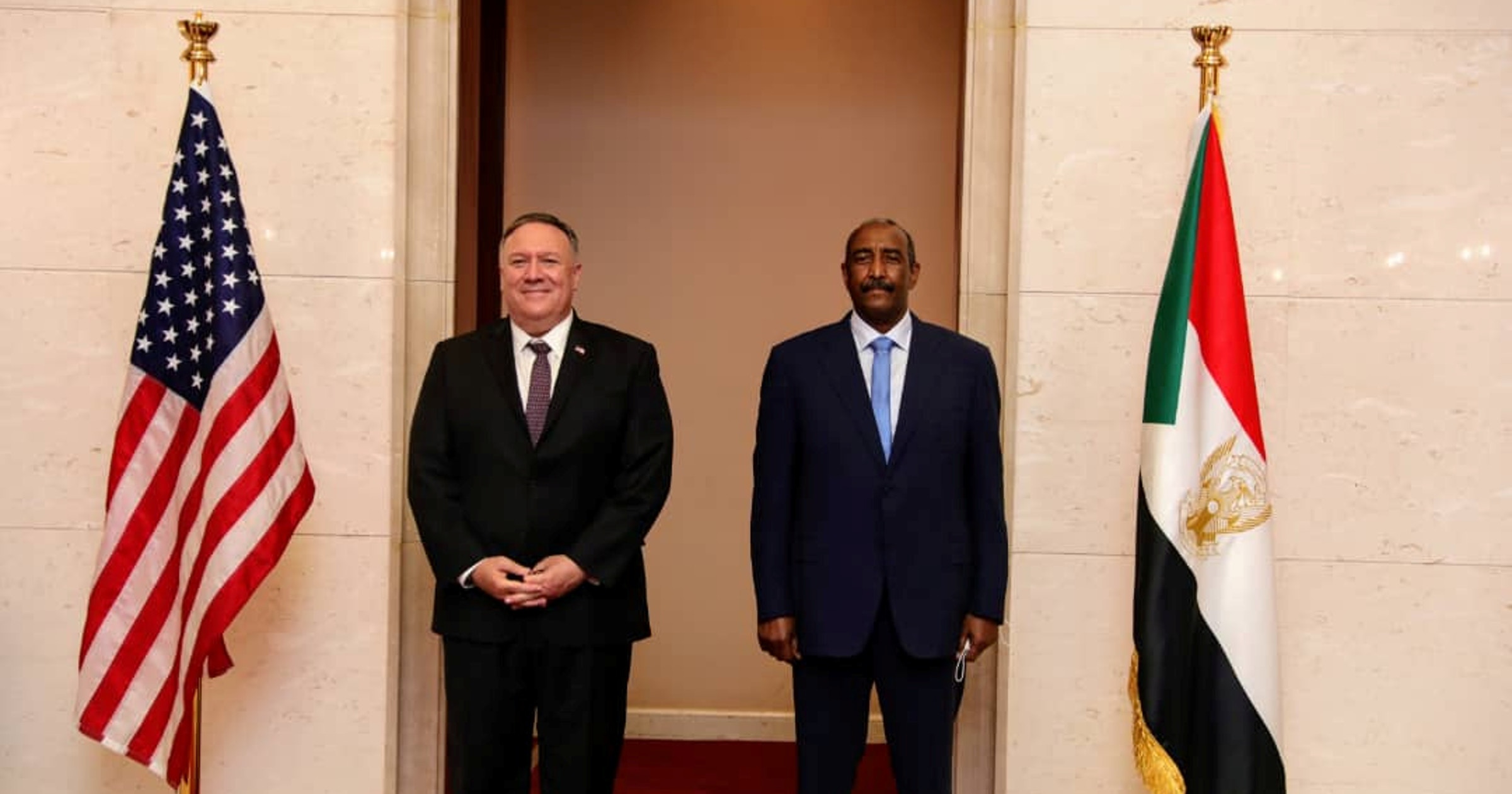US Secretary of State Mike Pompeo, left, with Abdel-Fattah Burhan, head of Sudan's ruling sovereign council, in Khartoum in this August 25, 2020 