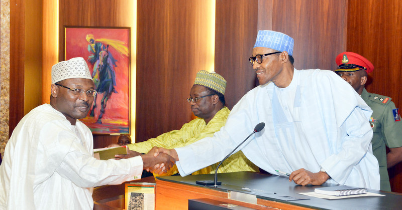 File Photo: President Muhammadu Buhari (R) and Prof. Mahmood Yakubu