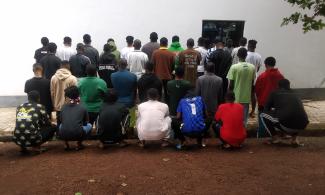 33 Suspected Internet Fraudsters Arrested In Nigeria’s Enugu State, Posh Cars, 49 Mobile Phones, Others Recovered