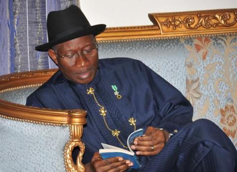 President Jonathan reading