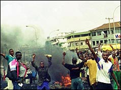 Crowds blocked roads with burning cars