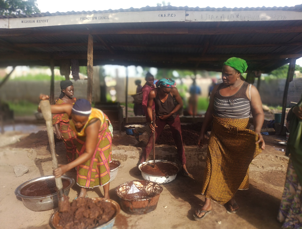 Kaiama women shea collectors, manually processing the grinded shea nuts. Photo Credit: Elfredah Kevin-Alerechi