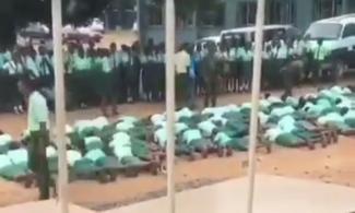Soldiers flogging students 