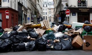 Street Garbage Piles Up As Nationwide Protests Rock France After President Macron Insists On New Pension Bill