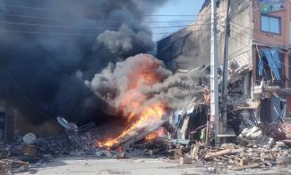 Woman Collapses While Trying To Put Out Fire That Razed Four Buildings At Lagos Market