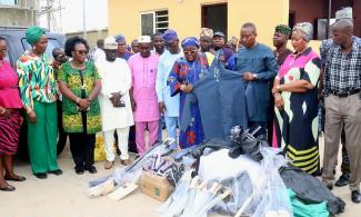 Lagos Council Chairman Distributes Cutlasses, Spades, Torches To Security Personnel As 'Working Tools' To Enhance Community Safety 