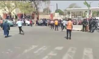 Drama As Angry Workers Protest, Chase FCT Minister Wike’s Convoy As He Sneaks Out Through Back Gate