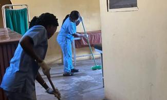 Nurses at OOUTH, Sagamu, performing cleaning duties